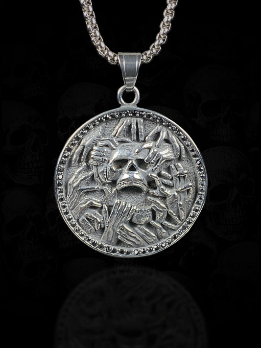 Grasping Hands Skull Necklace